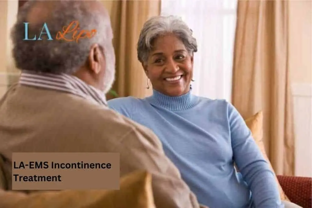 Couple sat smiling at each other - LA-EMS treatment Hertford