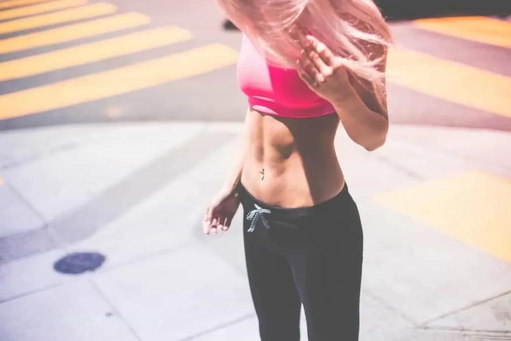 Woman with toned stomach after LA-EMS Body Sculpting Treatment Hertford